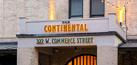 Front entrance of the Continental with street address 322 W. Commerce St. underneath the sign